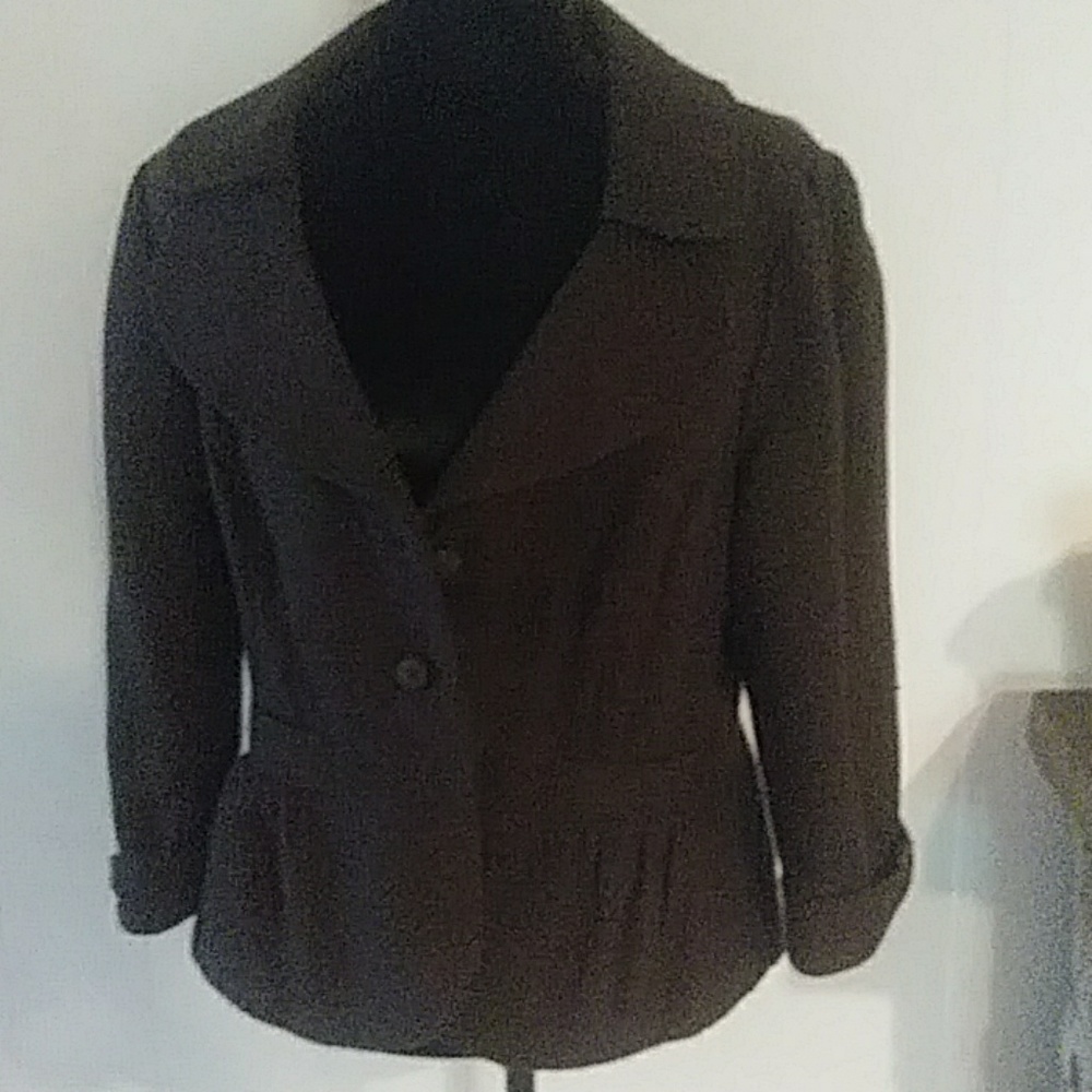 Brown fall lined blazer with tailored look.